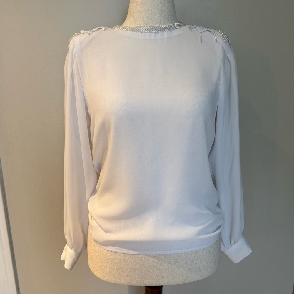 Elegant White Blouse with Embroidered Details